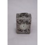 A SMALL VINTAGE WHITE METAL CARRIAGE CLOCK -APPROXIMATELY 7CM