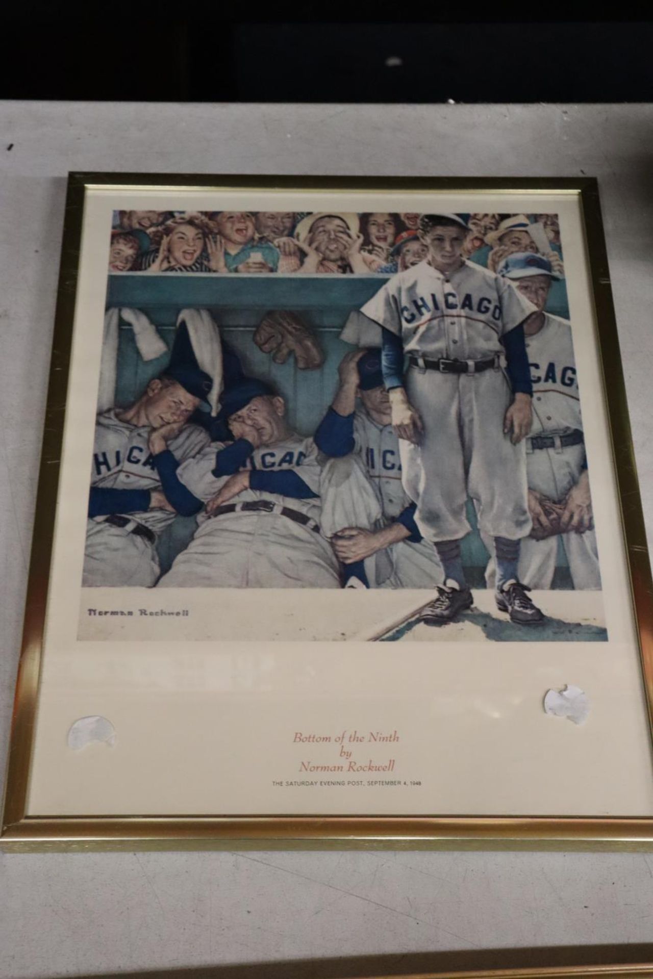 A FRAMED NORMAN ROCKWELL BASEBALL PRINT, 'BOTTOM OF THE NINTH'