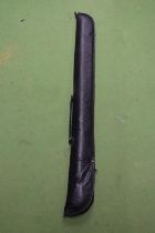 A SNOOKER CUE IN A SOFT CASE