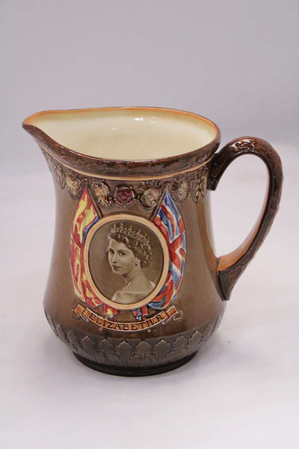 A ROYAL DOULTON CORONATION JUG - APPROXIMATELY 16CM