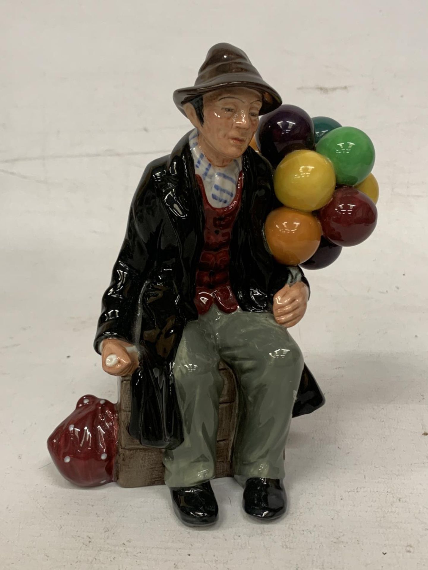 A ROYAL DOULTON FIGURE "THE BALLOON MAN" HN 1954