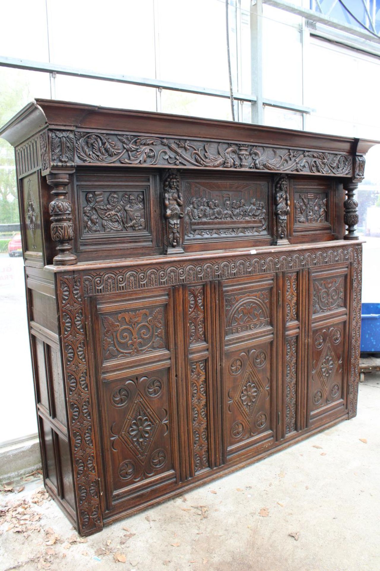 AN OAK GEORGE III STYLE COURT CUPBOARD WITH CARVED PANELS, THREE DEPICTING THE BIRTH AND - Bild 2 aus 13