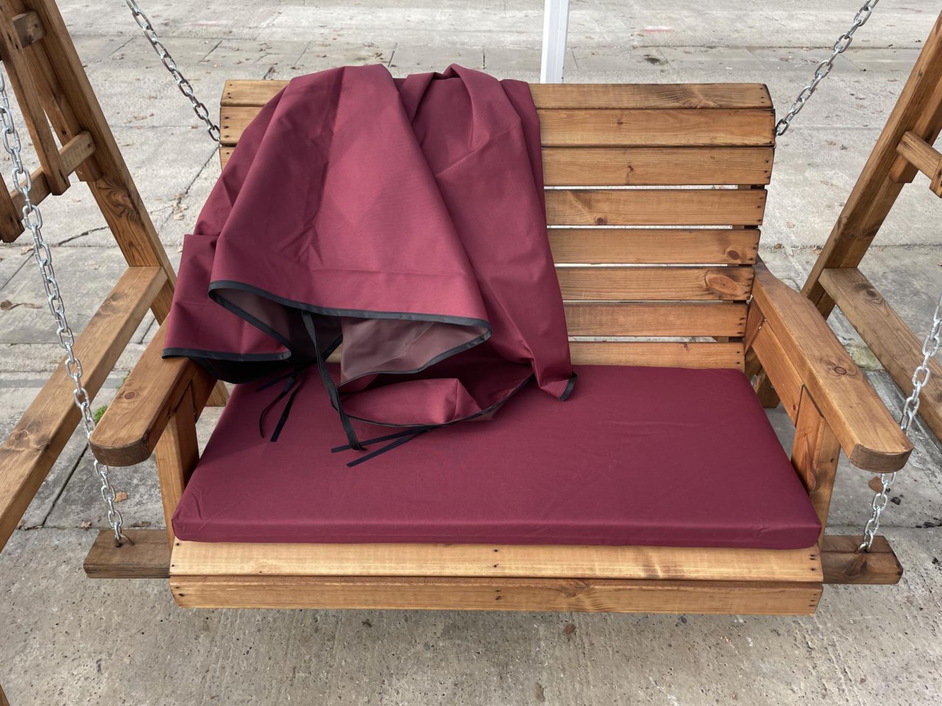 AN AS NEW EX DISPLAY CHARLES TAYLOR GARDEN FURNITURE SWING SEAT WITH