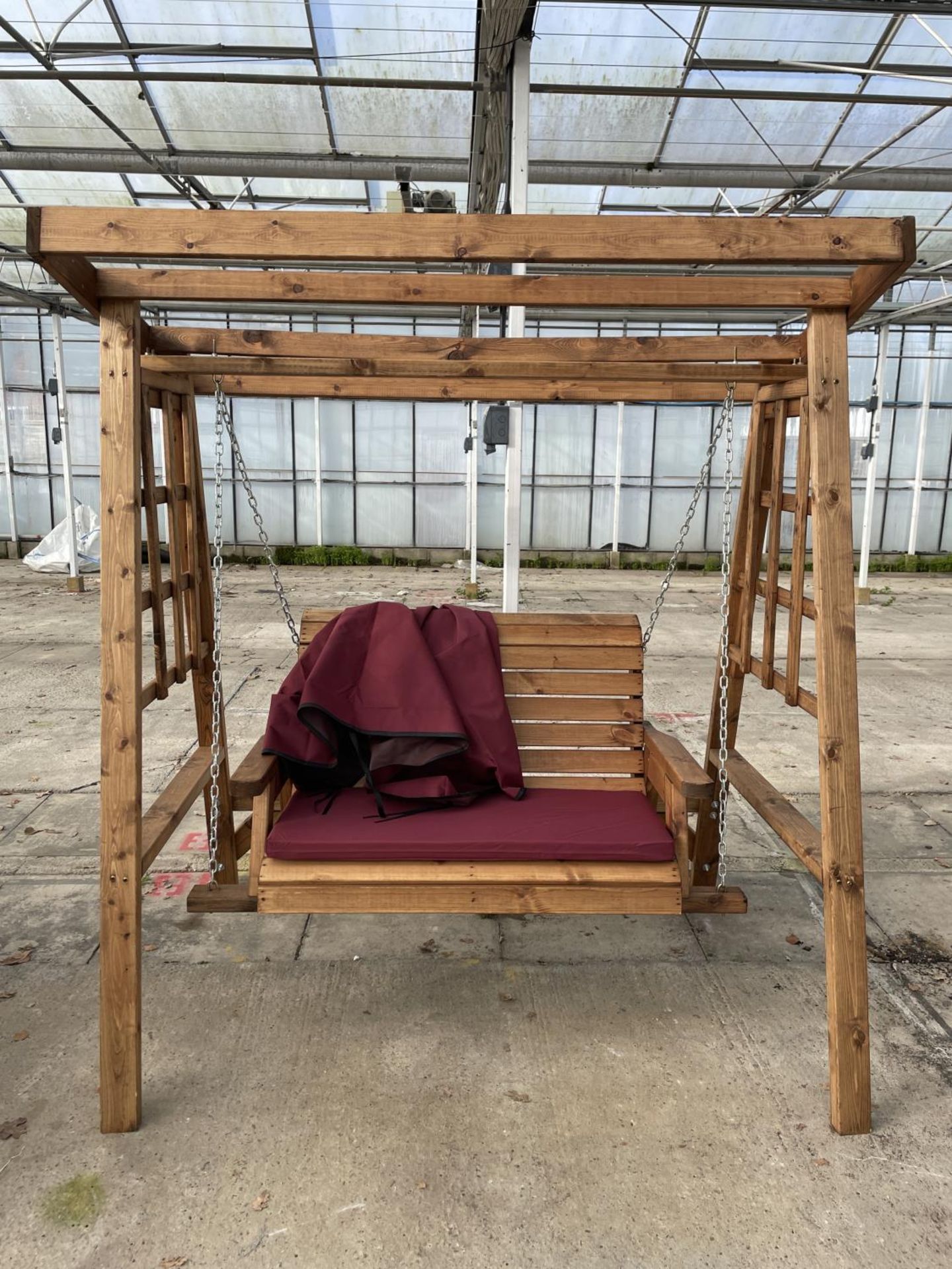 AN AS NEW EX DISPLAY CHARLES TAYLOR GARDEN FURNITURE SWING SEAT WITH