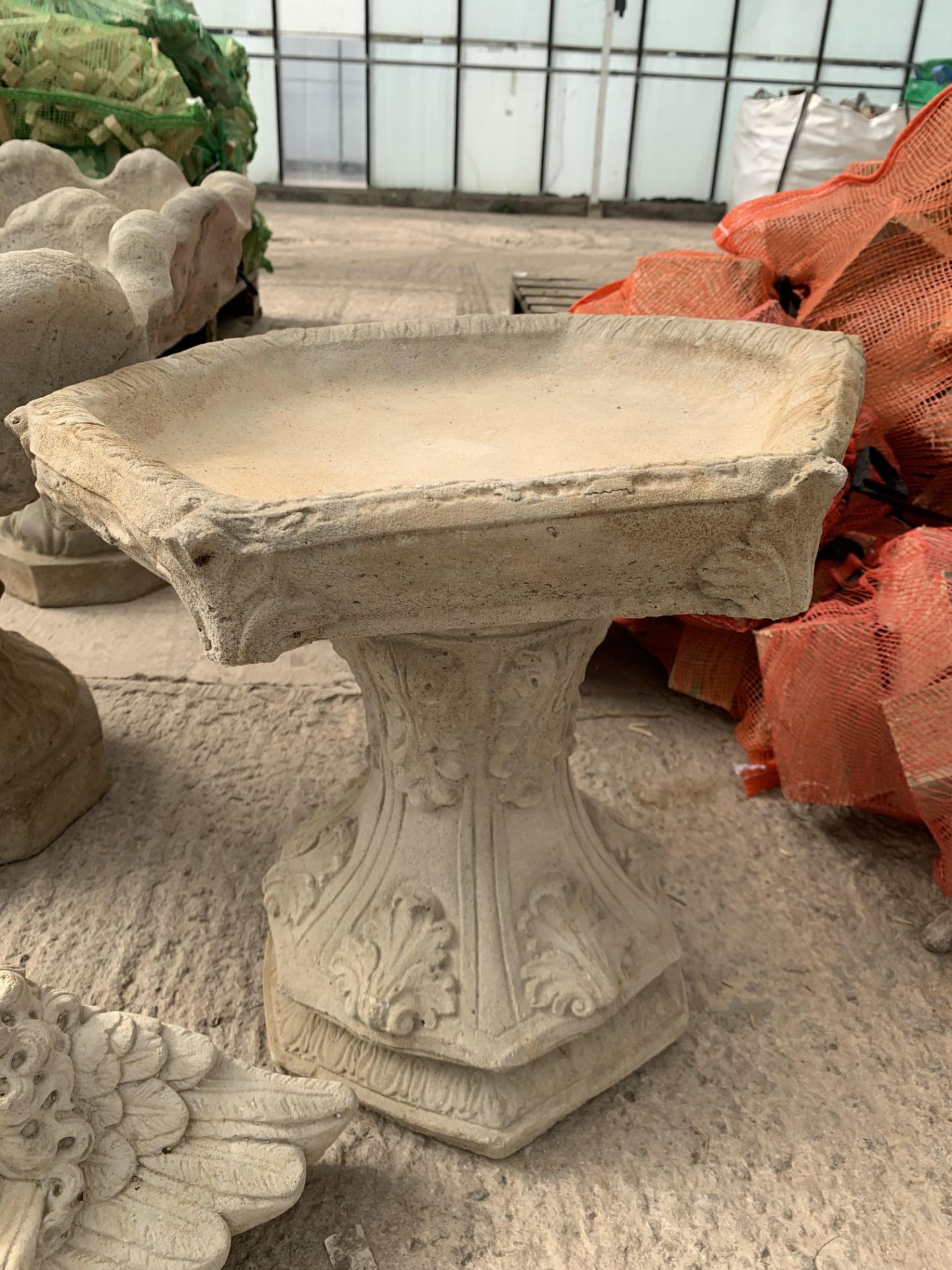 A CONCRETE HEXAGONAL BIRD BATH NO VAT