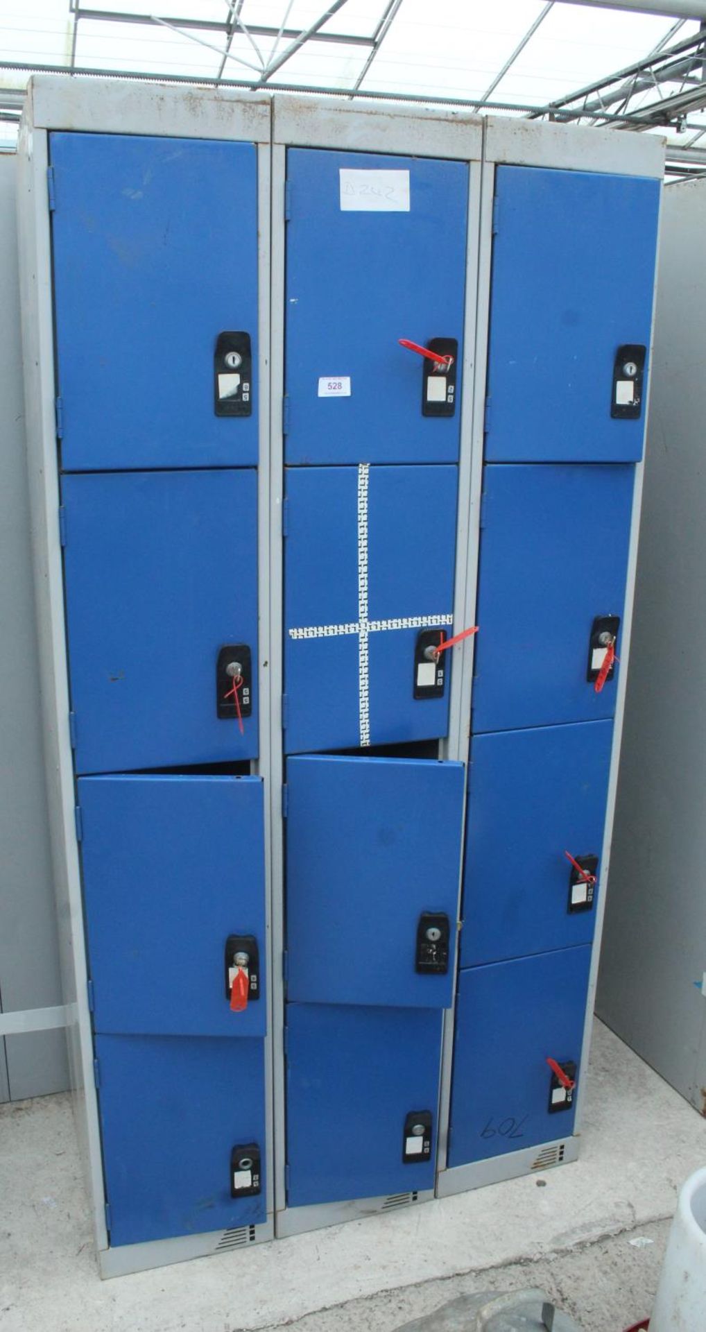 A BLOCK OF 12 LOCKERS MOSTLY WITH KEYS + VAT