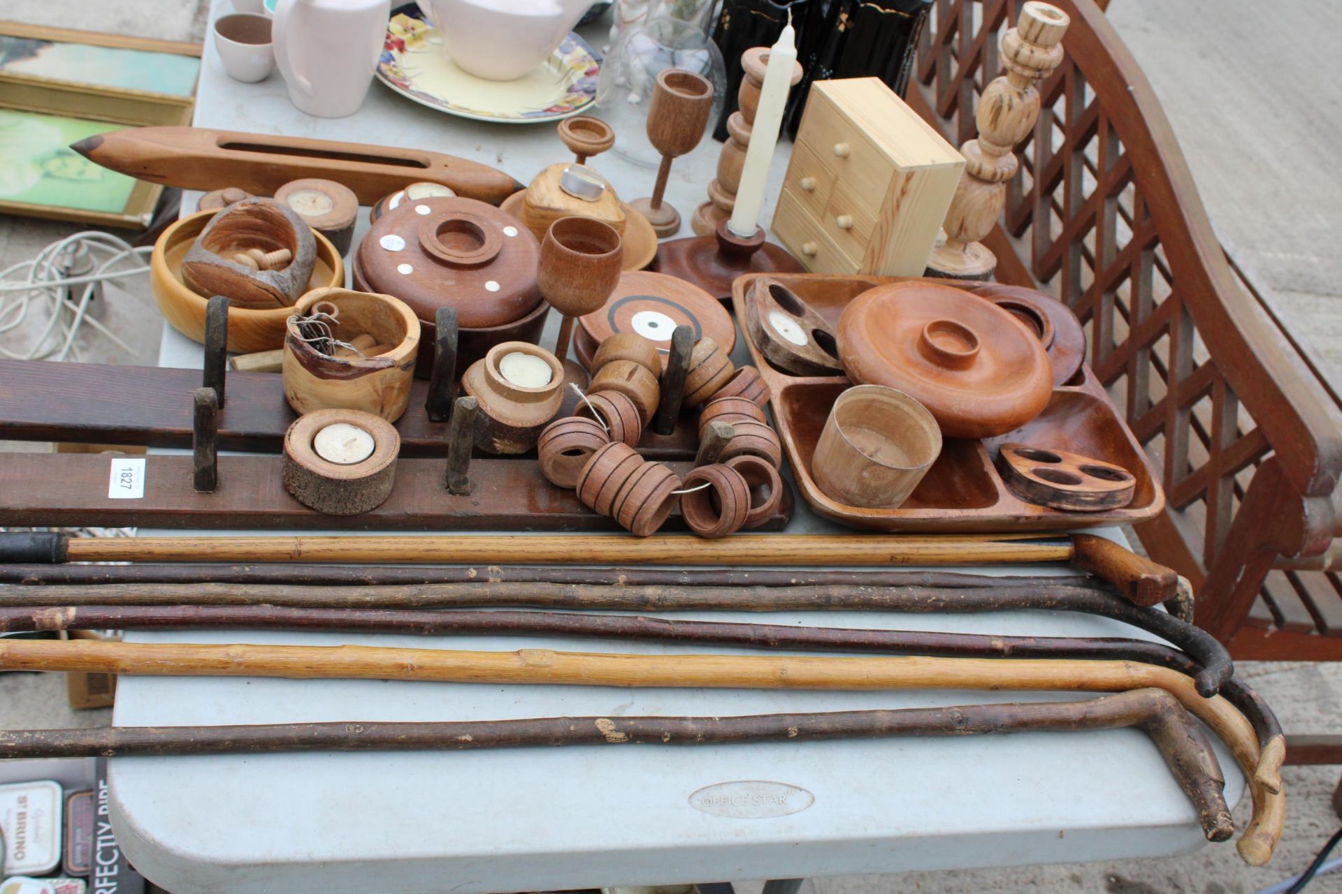 AN ASSORTMENT OF TREEN ITEMS TO INCLUDE WALKING STICKS, NAPKIN RINGS AND CANDLESTICKS ETC - Image 2 of 3