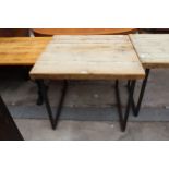 A RUSTIC FOUR PLANK TABLE, 36" X 33" ON METAL LEGS