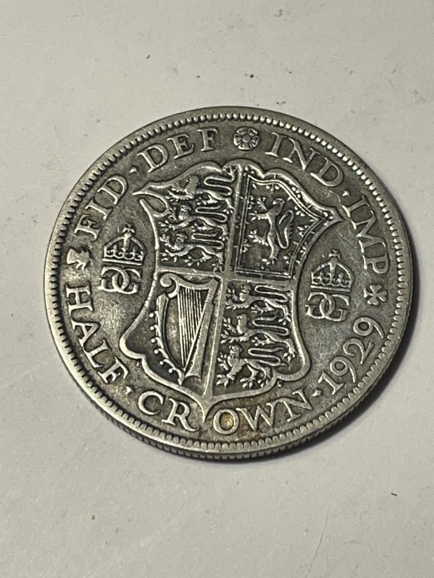 A SILVER 1929 HALF CROWN