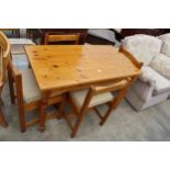A MODERN PINE KITCHEN TABLE, 48" X 26" AND FOUR CHAIRS