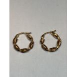A PAIR OF 9 CARAT GOLD TWISTED HOOP EARRINGS GROSS WEIGHT 1.21 GRAMS