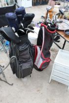 TWO GOLF BAGS WITH A LARGE ASSORTMENT OF GOLF CLUBS TO INCLUDE HIPPO, SKYMAX AND LYNX ETC