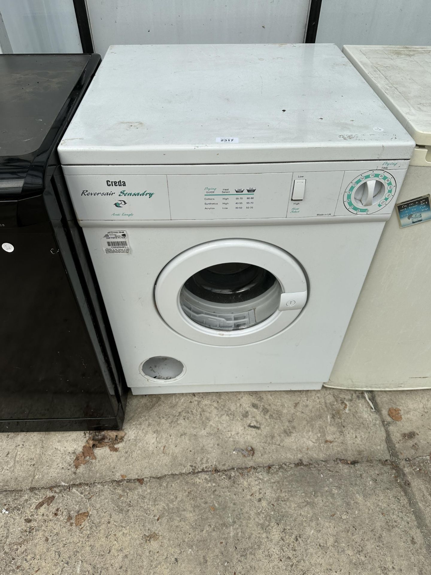 A WHITE CREDA WASHING MACHINE