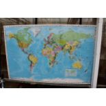 A VINTAGE CLASSROOM MAP OF THE WORLD IN FRAMEWORK, 52" X 34"