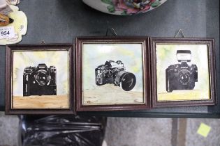 ASET OF THREE HAND PAINTED TILES OF CAMERAS