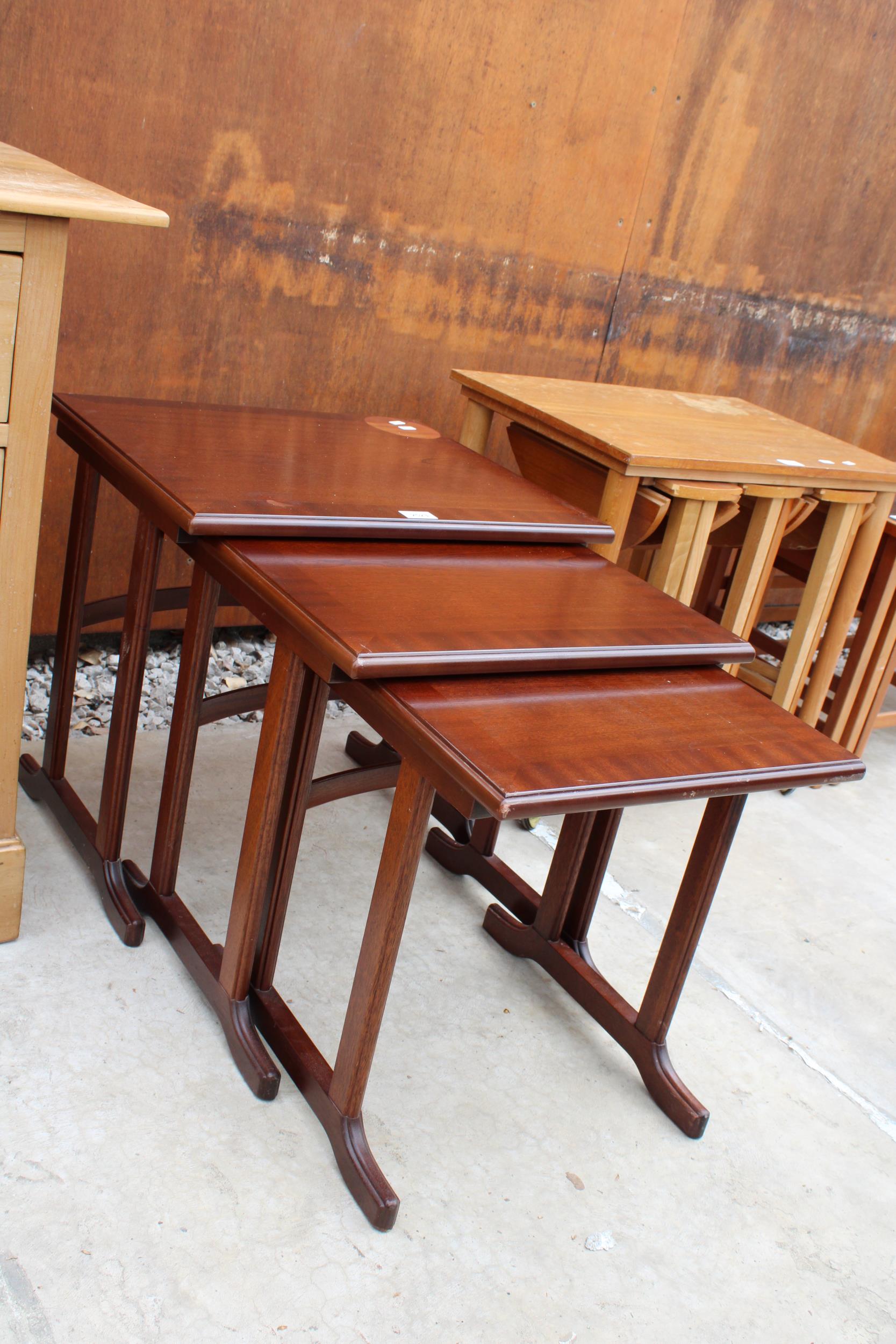 A NEST OF THREE MAHOGANY AND CROSSBANDED G.PLAN TABLES - Image 2 of 3