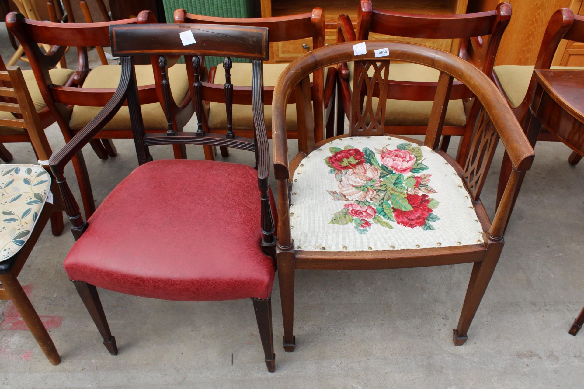 AN EDWARDIAN MAHOGANY AND INLAID TUB CHAIR AND 19TH CENTURY MAHOGANY ELBOW CHAIR