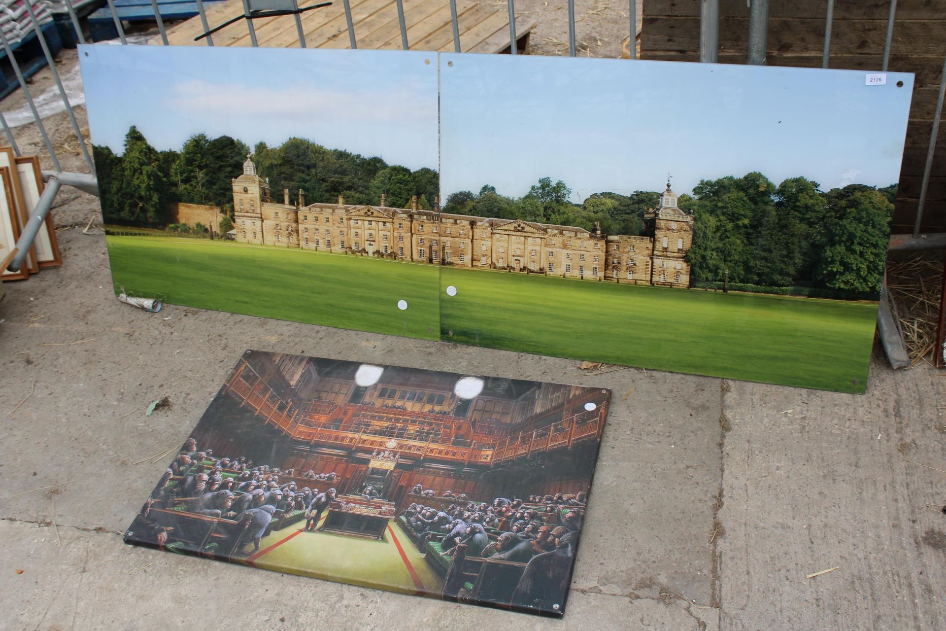 A LARGE PERSPEX PRINT OF A MANOR HOUSE AND A FURTHER NOVELTY CANVAS PRINT OF PARLIMENT