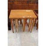 A NEST OF FOUR POUL HUNDEVAD DESIGN TABLES, THREE BEING DROP LEAF, 15" DIAMETER