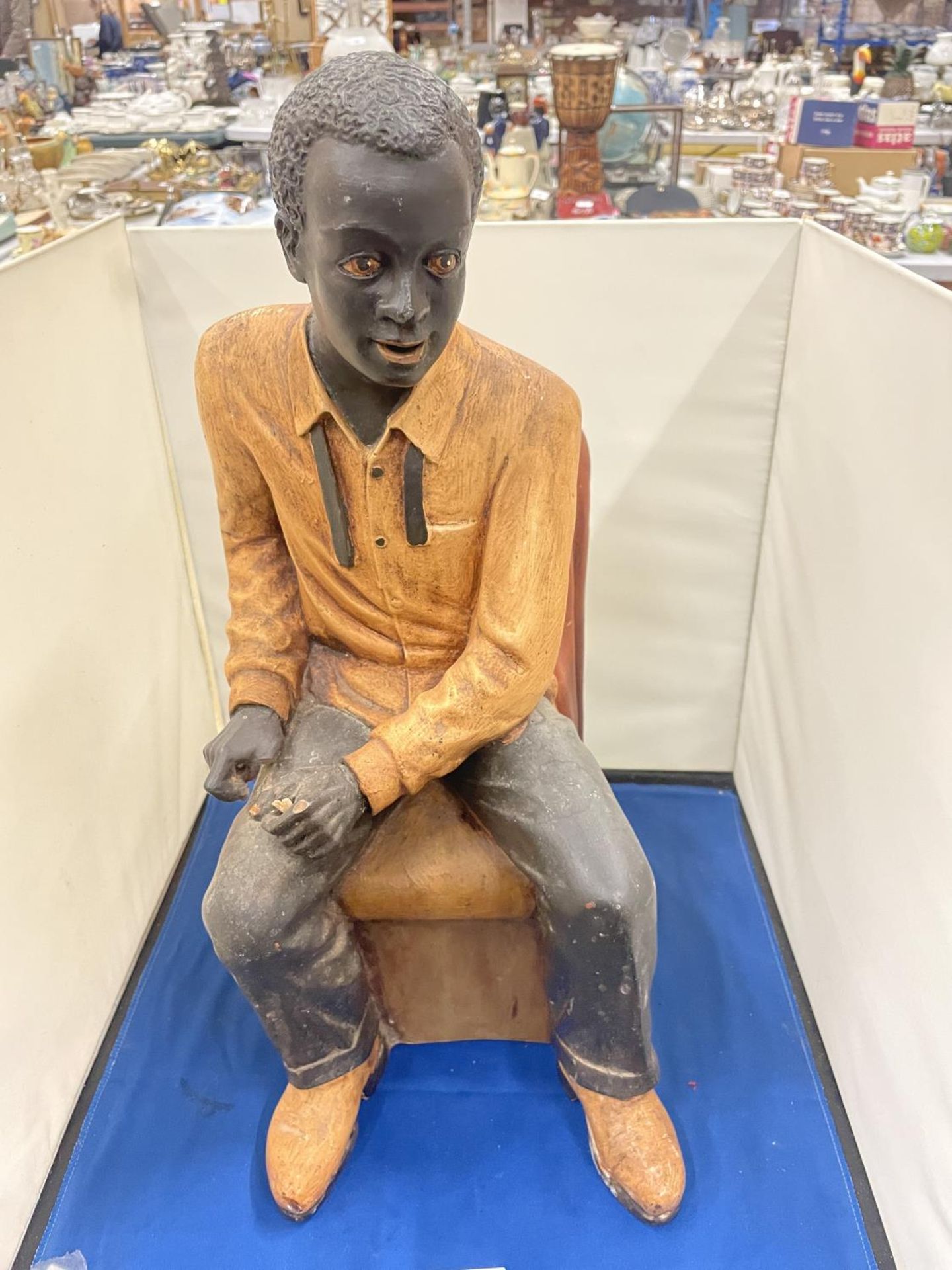 A LARG FIGURE OF A MAN SITTING IN A CHAIR - Image 2 of 8