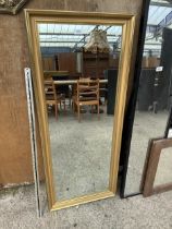 A RECTANGULAR GILT FRAMED MIRROR