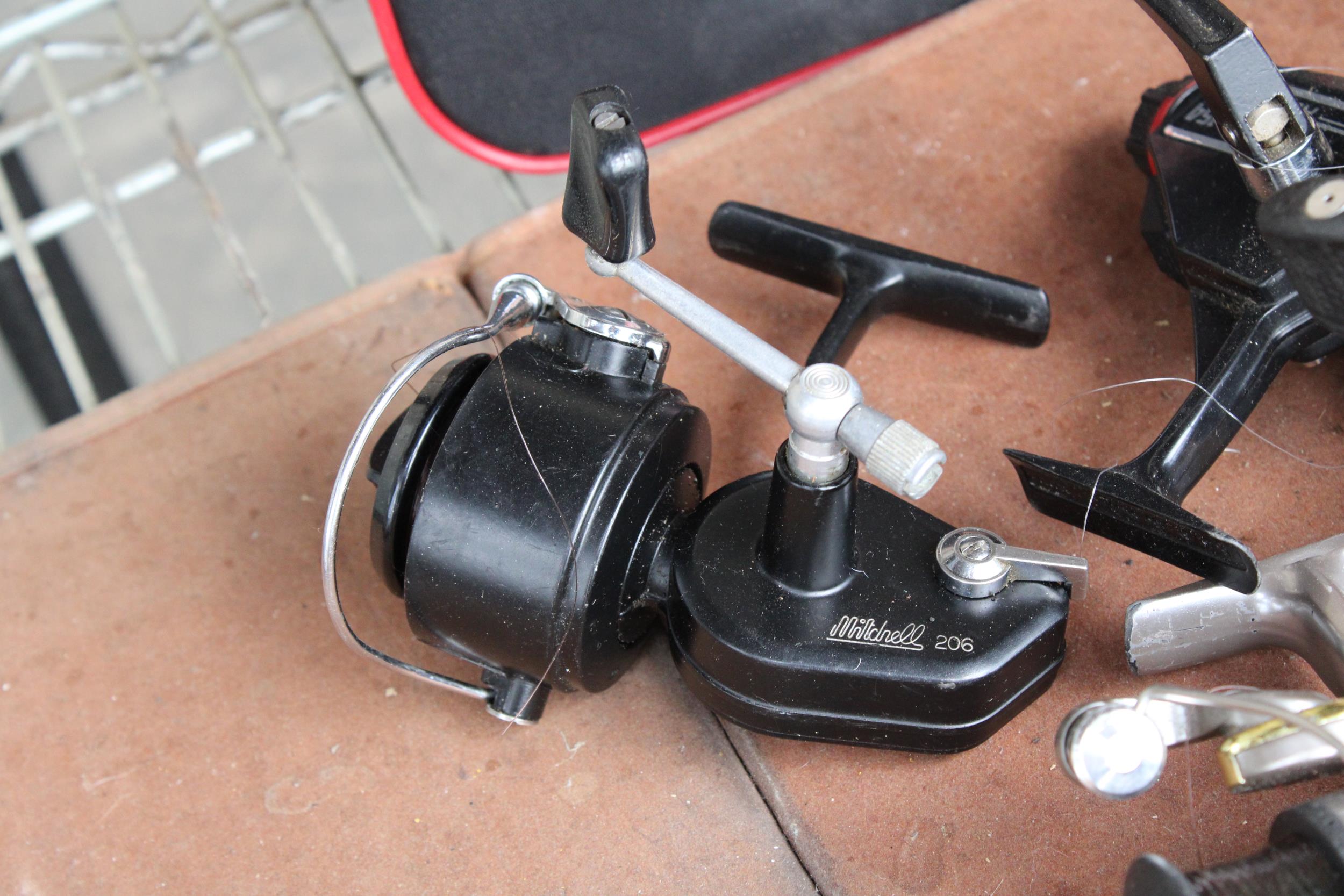 AN ASSORTMENT OF VARIOUS FISHING REELS TO INCLUDE MITCHELL AND ABU ETC - Image 2 of 3