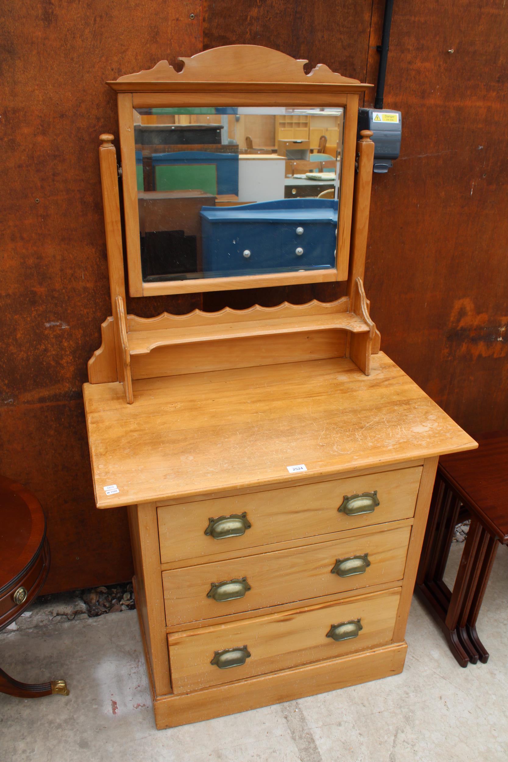 A VICTORIAN SATINWOOD DRESSING CHEST WITH THREE DRAWERS HAVING BRASS SCOOP HANDLES, 33" WIDE