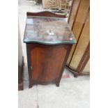 A MAHOGANY AND CROSSBANDED SERPENTINE FRONT BEDSIDE LOCKER 15.5" WIDE