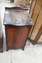 A MAHOGANY AND CROSSBANDED SERPENTINE FRONT BEDSIDE LOCKER 15.5" WIDE