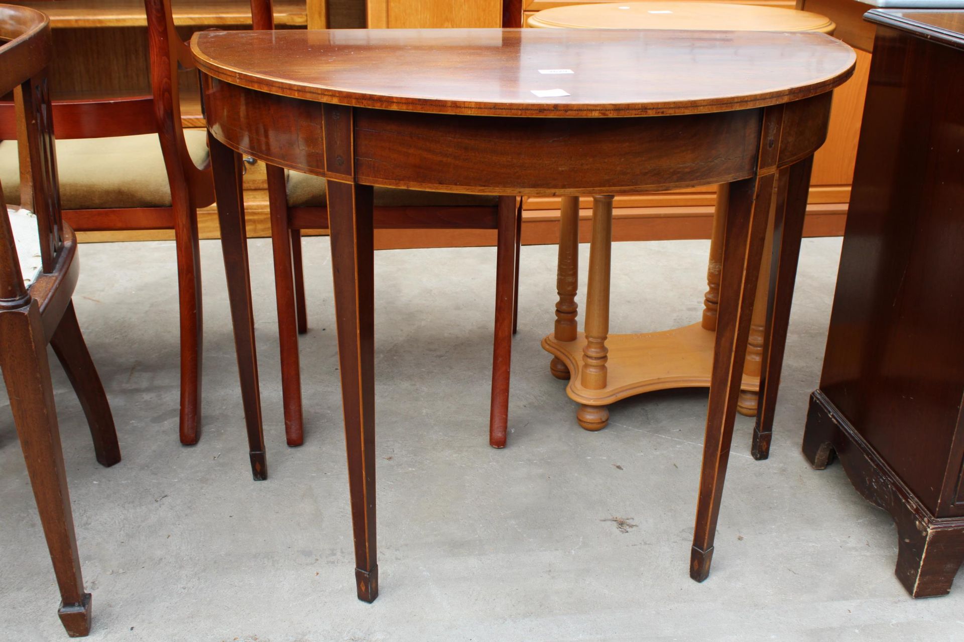 A 19TH CENTURY MAHOGANY AND CROSSBANDED DEMI-LUNE TABLE ON TAPERING LEGS WITH SPADE FEET , 36" WIDE - Image 2 of 3