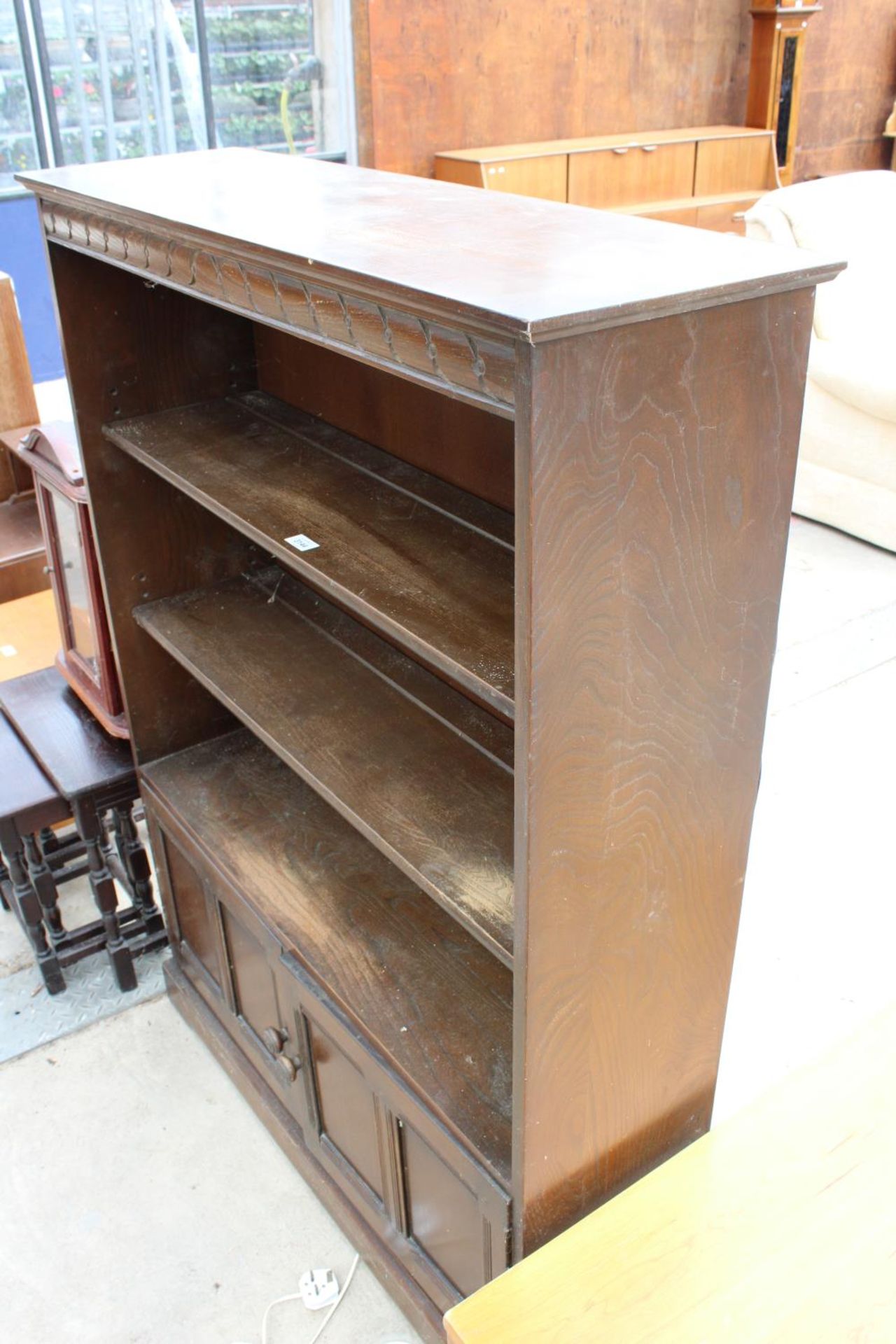 AN ELM ERCOL STYLE OPEN BOOKCASE WITH CUPBOARDS TO BASE - 40" WIDE - Image 2 of 2