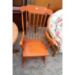 A VICTORIAN STYLE ROCKING CHAIR