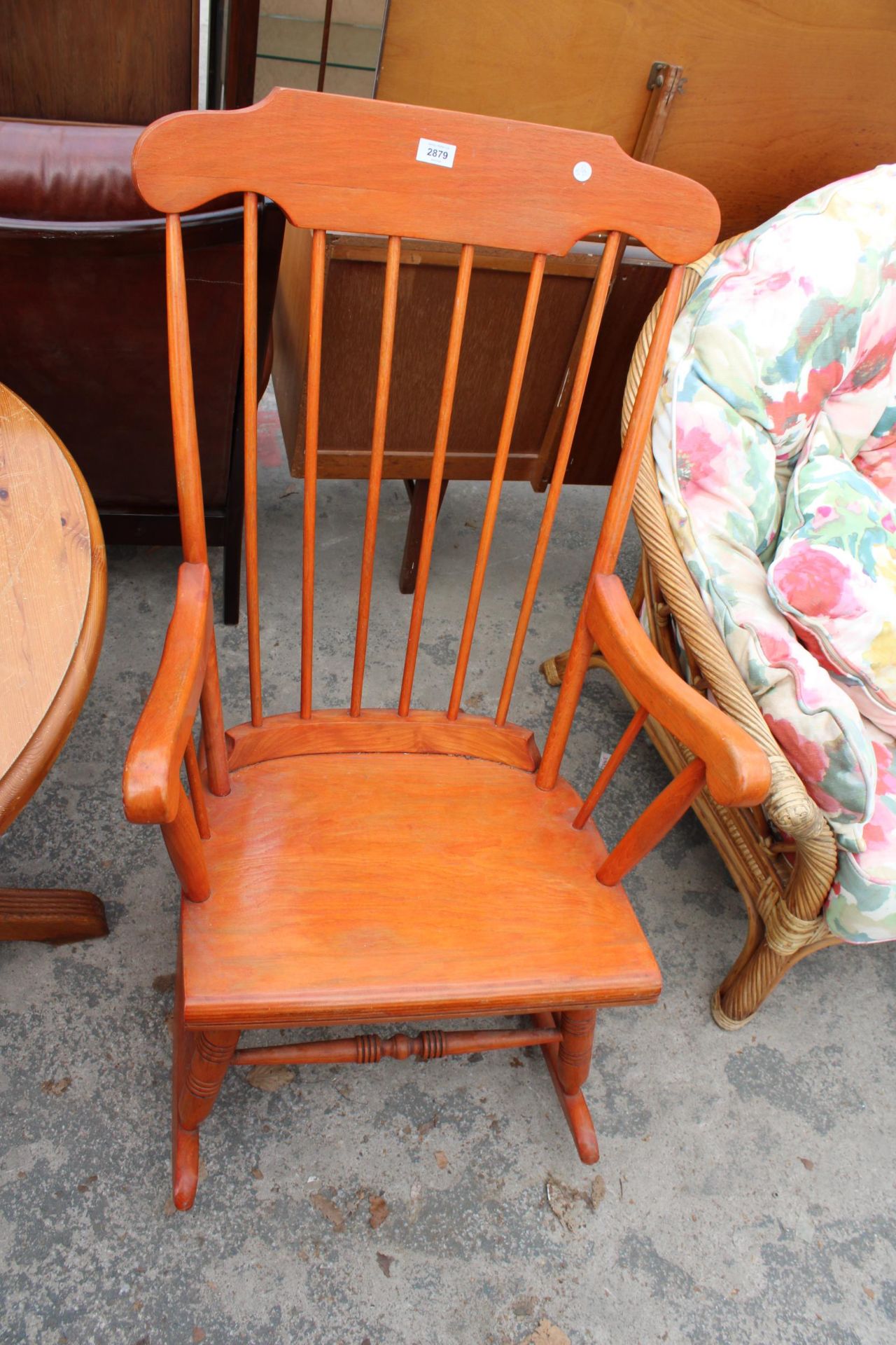 A VICTORIAN STYLE ROCKING CHAIR