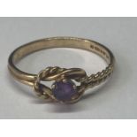 A 9 CARAT GOLD RING WITH AMETHYST STONE SIZE O/P