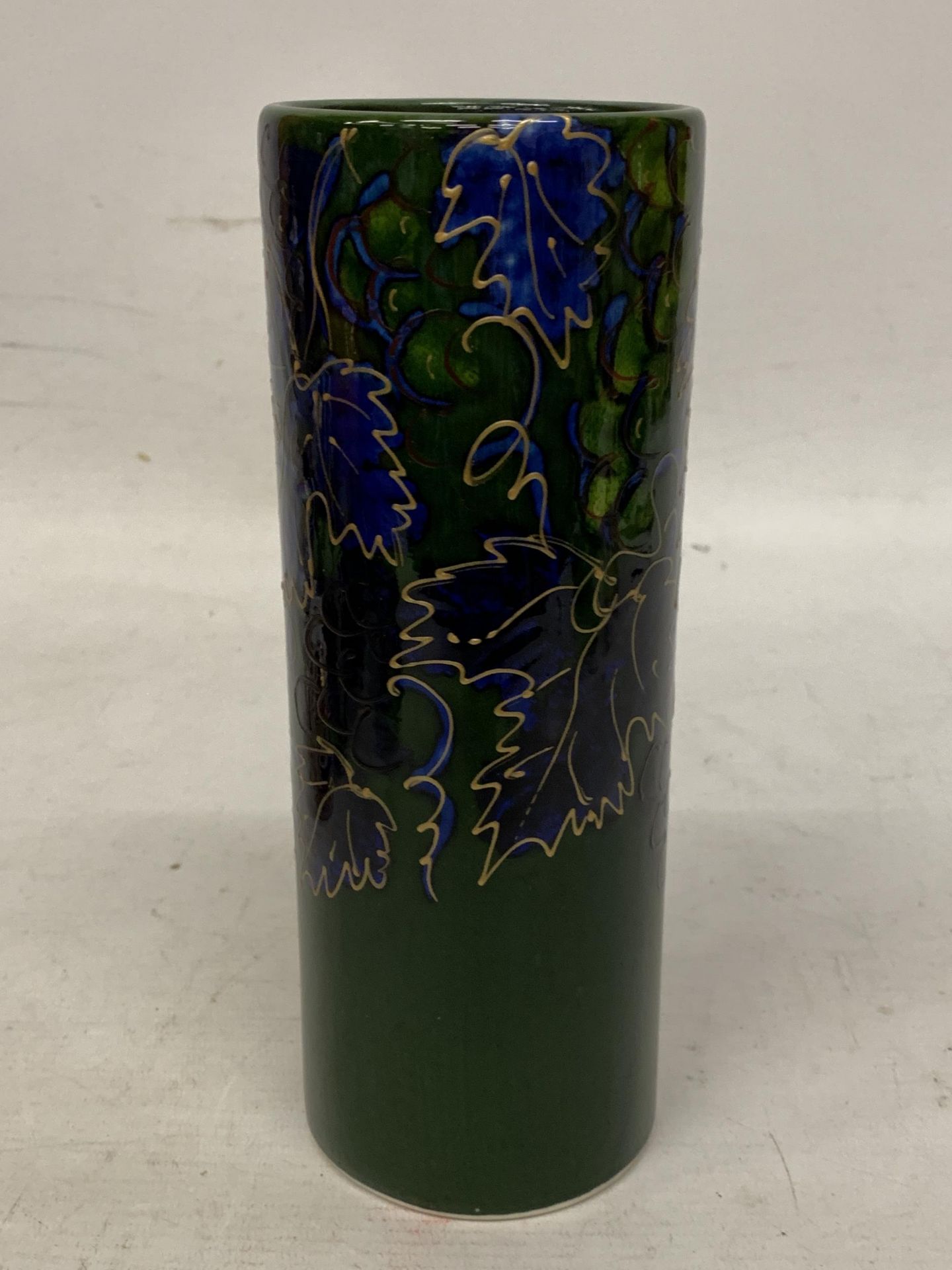 AN ANITA HARRIS VINEYARD VASE SIGNED IN GOLD