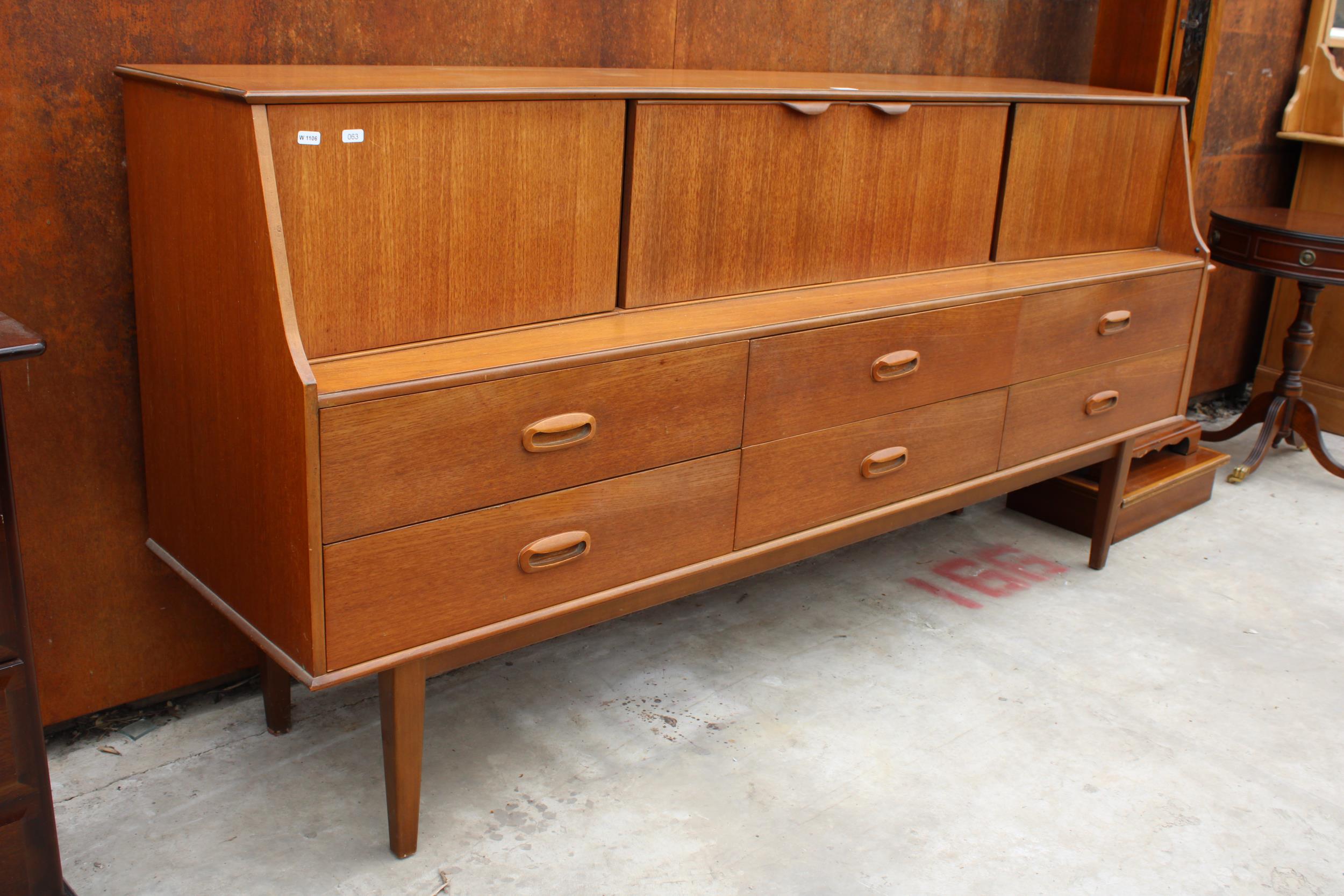 A RETRO TEAK PORTWOOD FURNITURE SIDEBOARD ENCLOSING SIX DRAWERS AND FOUR CUPBOARDS, 72" WIDE - Image 2 of 4