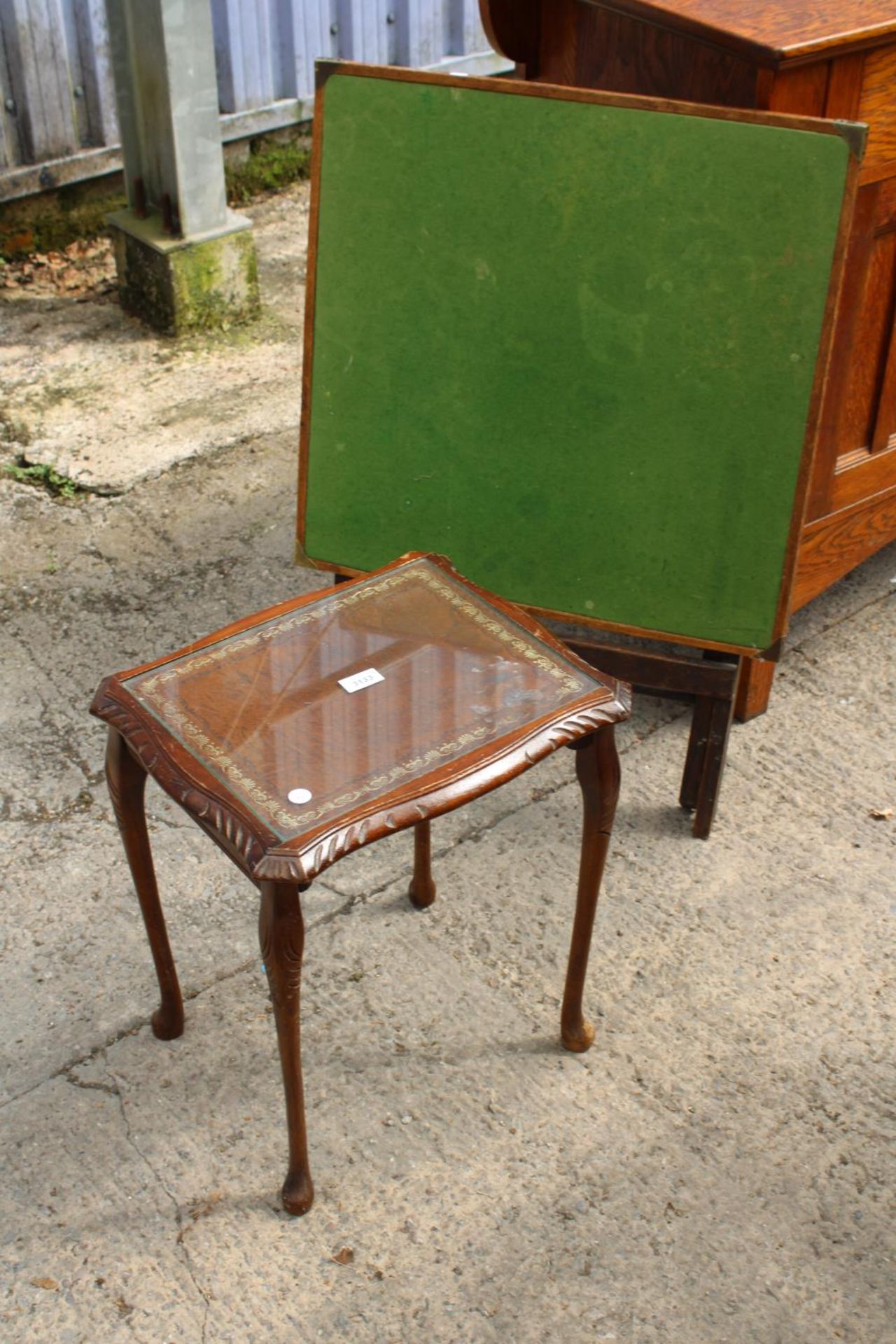 A FOLDING CARD TABLE AND A SMALL OCCASIONAL TABLE
