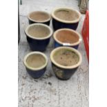 SIX VARIOUS SIZED BLUE GLAZED PLANT POTS