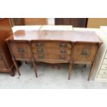 A REGENCY STYLE, MAHOGANY CROSSBANDED AND INLAID SIDEBOARD ON TAPERING LEGS, 63" WIDE