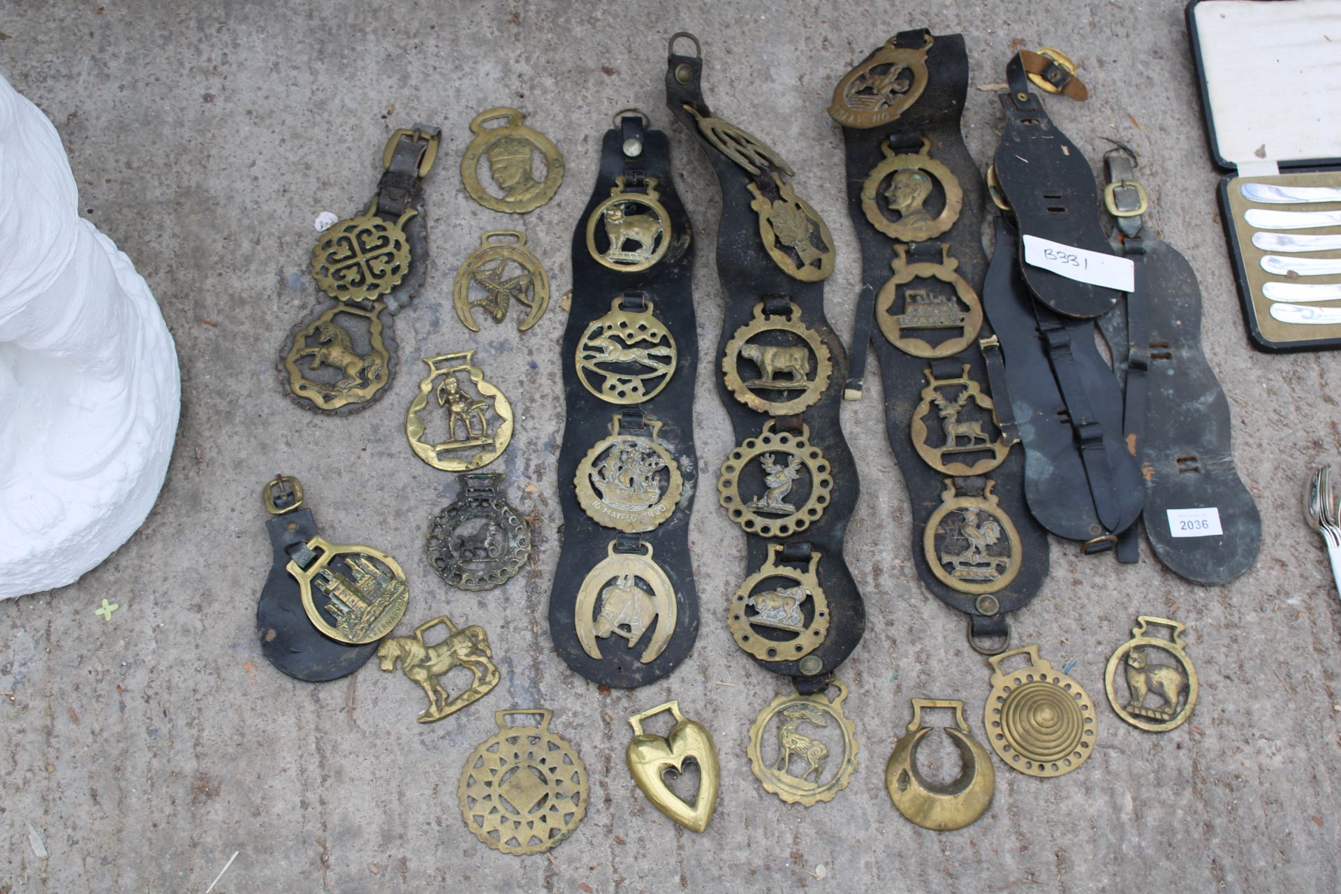 AN ASSORTMENT OF VINTAGE HORSE BRASSES