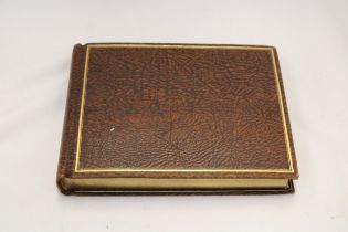 A VINTAGE LEATHER BOUND AUTOGRAPH BOOK FROM THE 1940'S WITH MOSTLY RELIGIOUS ENTRIES