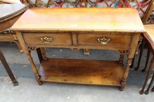 AN OAK GEORGE III STYLE TWO DRAWER SIDE-TABLE WITH POT BOARD AND TURNED LEGS, 36" WIDE