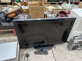 A PANASONIC TELEVISION WITH REMOTE CONTROL