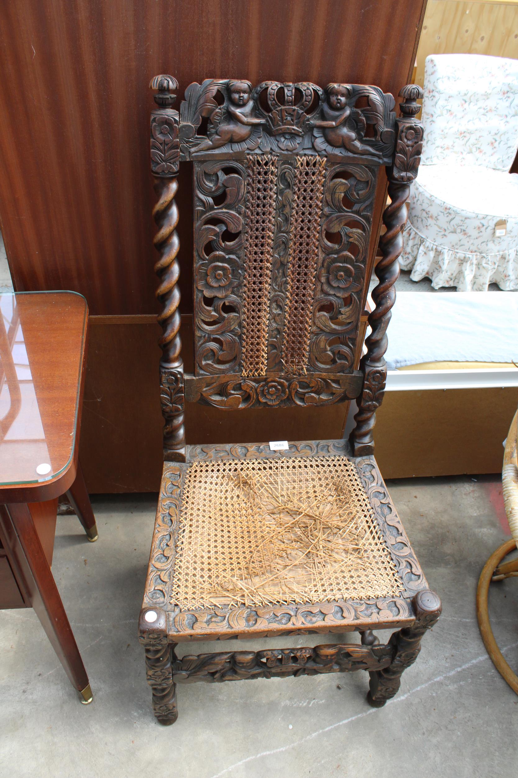 AN OAK JACOBEAN STYLE DINING CHAIR WITH BARLEY-TWIST UPRIGHTS AND STRETCHERS