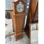 A WESTMINSTER CHIMING GRANDMOTHER CLOCK WITH ENGLISH MOVEMENT