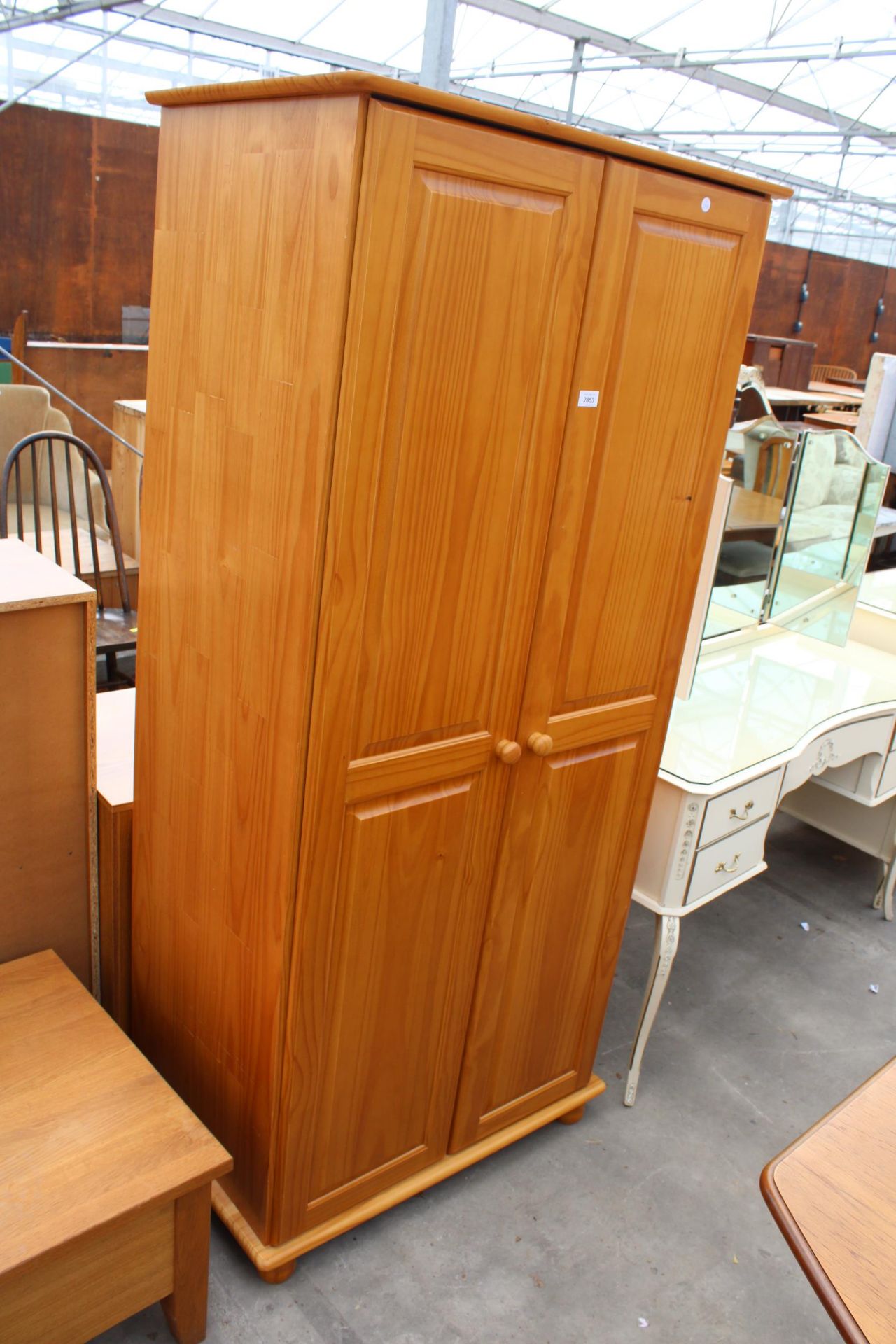 A MODERN PINE TWO DOOR WARDROBE, 32" WIDE