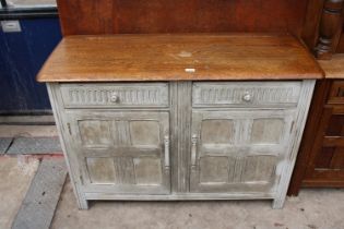 AN OAK JACOBEAN STYLE DRESSER