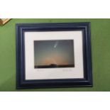 A FRAMED PICTURE OF COMET HALE-BOPP PASSING STONEHENGE ON 15TH APRIL 1997 AT 10.45 PM