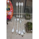 A SET OF EIGHT VINTAGE CAST IRON STAIRCASE SPINDLES