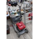 A HONDA HR1950 PETROL LAWN MOWER WITH GRASS BOX